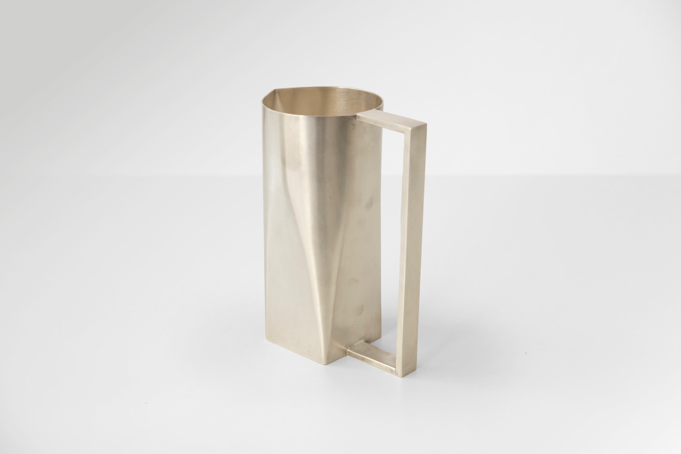 Vintage Brutalist Metal Pitchers
1960s-70s